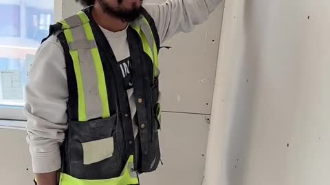 Rescuing a Pidgeon From Inside Wall at Construction Site