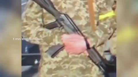 Ukraine soldier drops gun