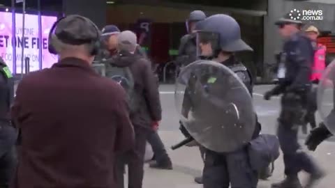 Anti-war protesters clash with Australian police at defense expo