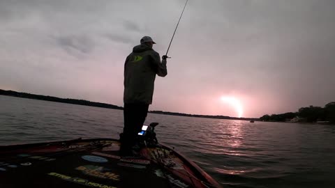 Lightning Storm over a Lake on a Fishing Boat