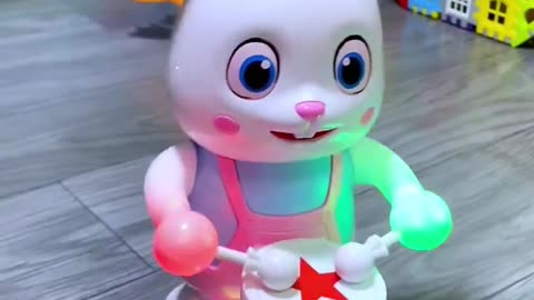 This drumming bunny🐰 is so cute. It has lights and music, can dance and play drums.