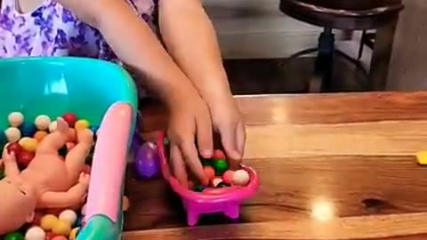 Amazing Cute 3 Year Old Girl Playing Gumball Candy & Baby Doll