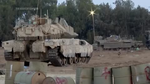 Israeli tanks seen at Gaza border as war drags on