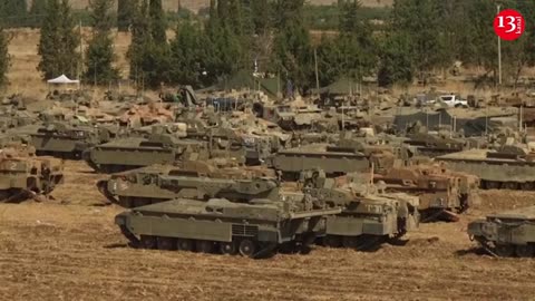 Israeli troops and military vehicles seen in northern Israel