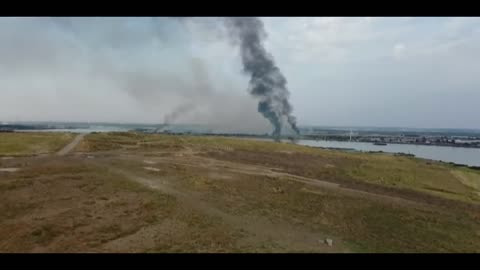 Smoke billows from wildfire-ravaged plains