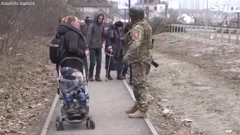 Ukrainian civilians flee as Russian shelling intensifies in Ukrainian city of Irpin