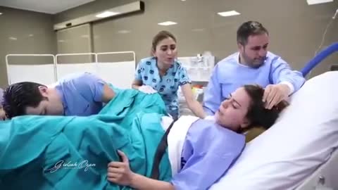 look at the father's face watching his son be born