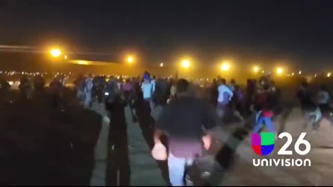 Illegals storming the border in El Paso last night