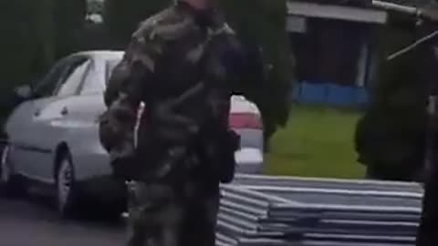 Irish woman confronts soldiers