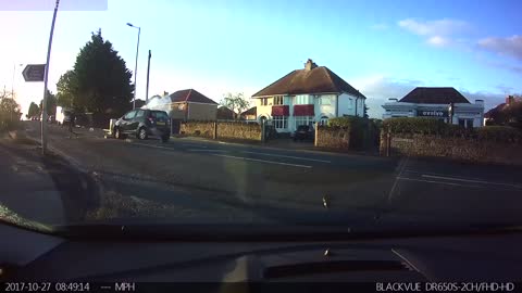 Close Call When Car Hits Traffic Island