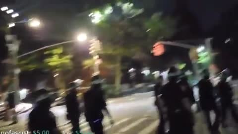 black man calls an Asian-American officer a “chink” at the Washington Square Park protest in NYC.