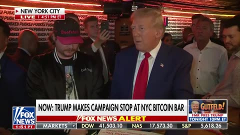 Watch: Trump makes transaction with Bitcoin at NYC bar