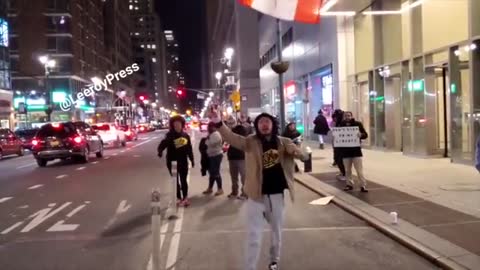 PEOPLE FROM NYC STAND WITH CANADA