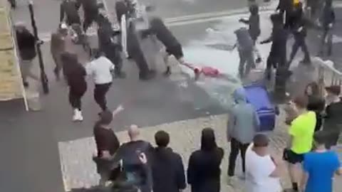 Sunderland, England — Rioters confront police at a protest over two-tier