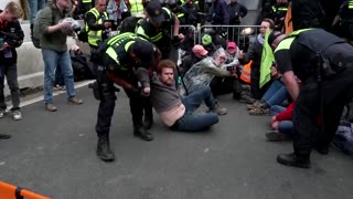 Climate activists arrested in oil subsidy protest on Dutch highway