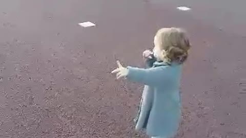 Baby girl says bye bye to Helicopter