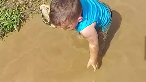 very cute having fun in the mud