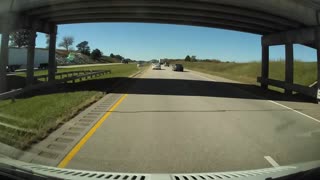 Police Car Runs off Highway onto Median