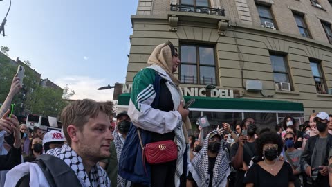 1of2 Palestinian Nerdeen Kiswani at the protest "SOUND THE ALARM FOR GAZA."