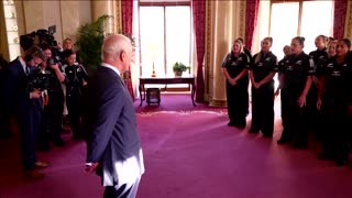 King Charles gets a group hug from NZ women's rugby team