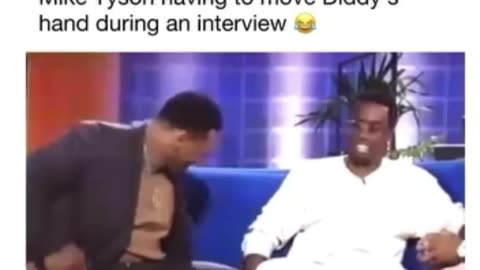 Mike Tyson Moving Diddy’s Hand During An Interview