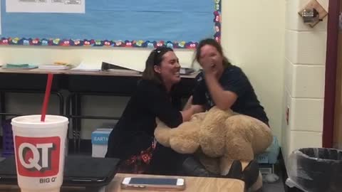 Woman Pranked By Life-Size Teddy Bear Costume at Staff Meeting