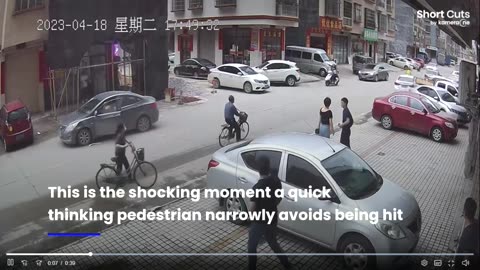 Pedestrian narrowly avoids being hit by out-of-control car.