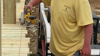 Cutting a 9 Foot Tall Deck Using a Skid Steer