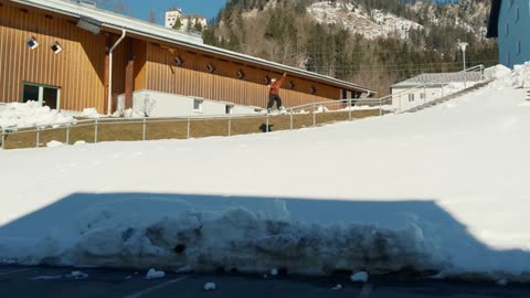 Freestyle Skiing Through a School