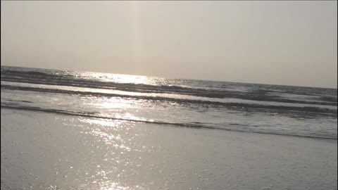 Sea movements waves sound bubbles moving on sand/ nature is beautiful