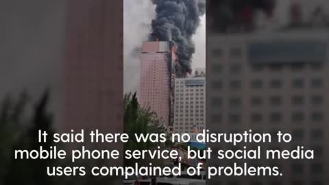 Thick smoke rises as major fire engulfs skyscraper in southern China