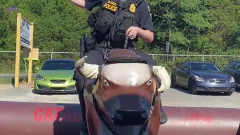 Ex-Police Officer Rides Mechanical Bull