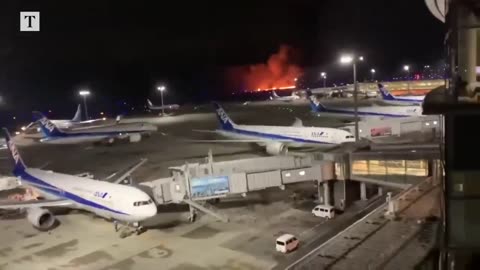 Moment Japan Airlines plane explodes on lending in Tokyo. Shot news.