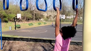 My daughter monkey bars super slow-mo