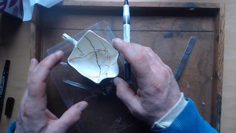 Traditional, lacquer based kintsugi, step 2c