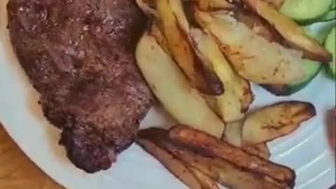 Steak and chips cooked in an air fryer are quick and easy