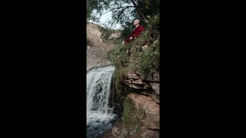 A Buddhist Monk meditating outdoors in Nature