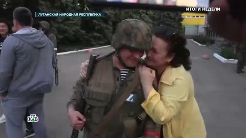 Celebration in the City of Svetldarsk. Hugging Russians for liberation