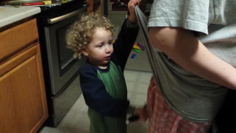 Tot Uses Magnifying Glass On Mom's Butt, Exclaims At How Huge It Is