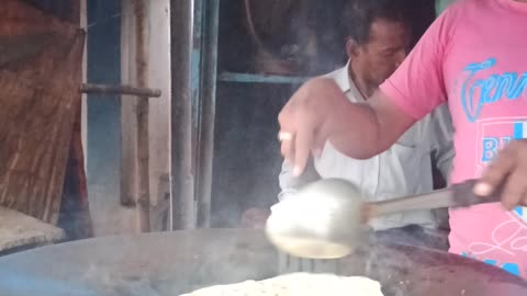 Indian Guy Making Street Food Bread