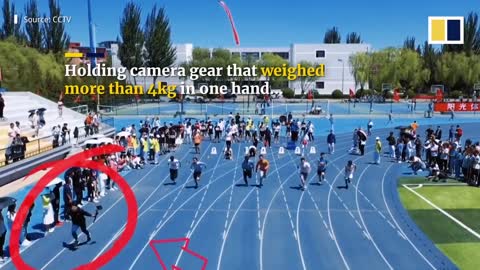 Speedy student cameraman keeps pace with sprinters in college dash in China