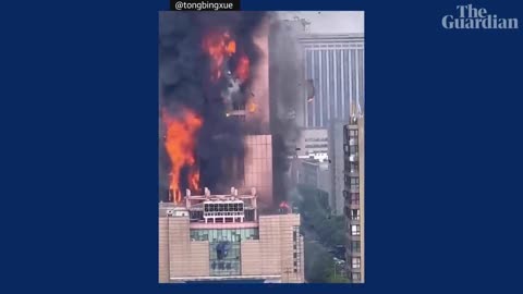 Huge fire engulfs skyscraper in China