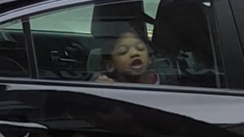 Girl Licks Window and Makes Silly Faces