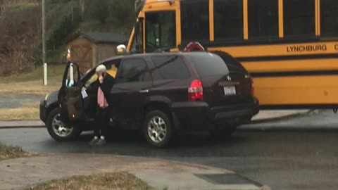 Car Bashes into a School Bus