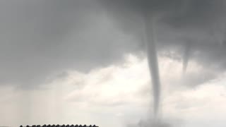 Water Spouts Touch Down Between Islands