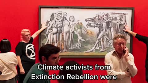 CLIMATE PROTESTERS GLUED THEMSELVES TO A PRIZED PICASSO