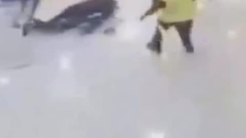 Coward holds a knife in a store. Coward gets tackled.