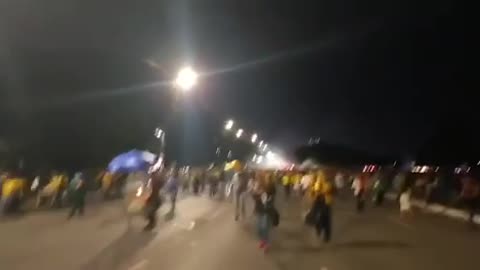 Brazilians who avoided arrest are heading down town.