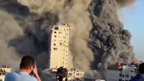 Watch: High - Rise Building in Gaza crumbles after Israeli airstrike|