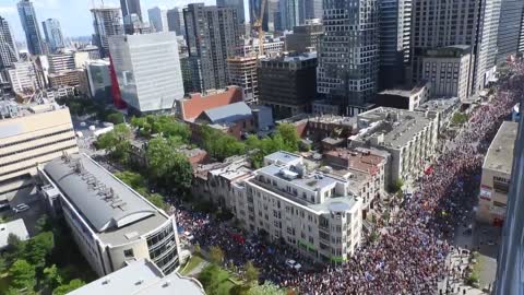 Large protest against the domestic vaccine passport in #Montreal, Canada.